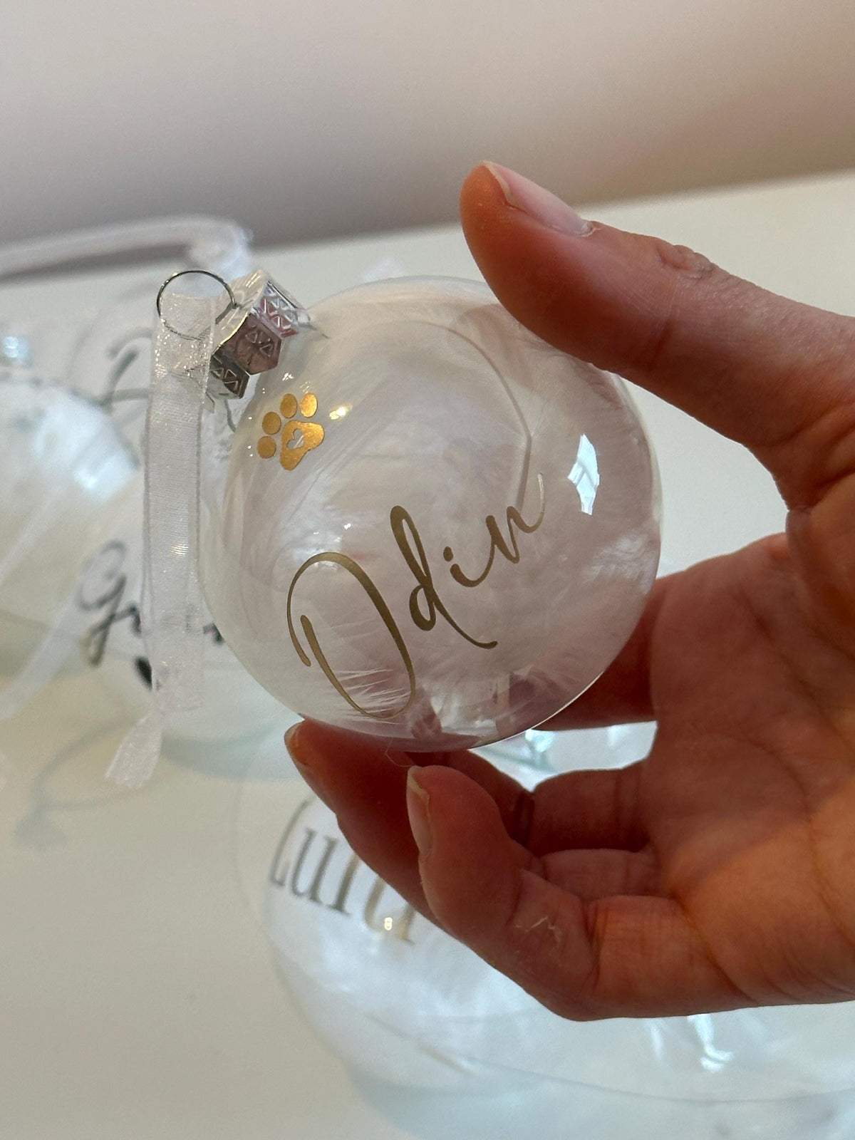 Personalised pet memorial feather bauble
